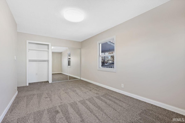 unfurnished bedroom with carpet