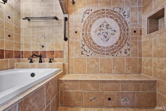 bathroom with tiled tub