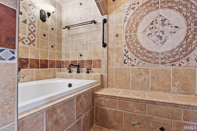 bathroom featuring tiled tub