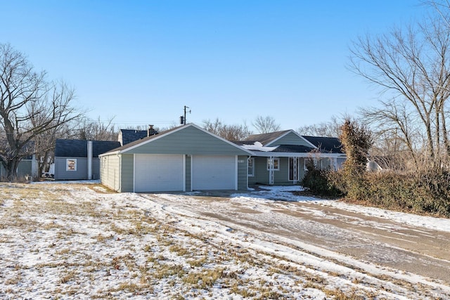 ranch-style house featuring a garage