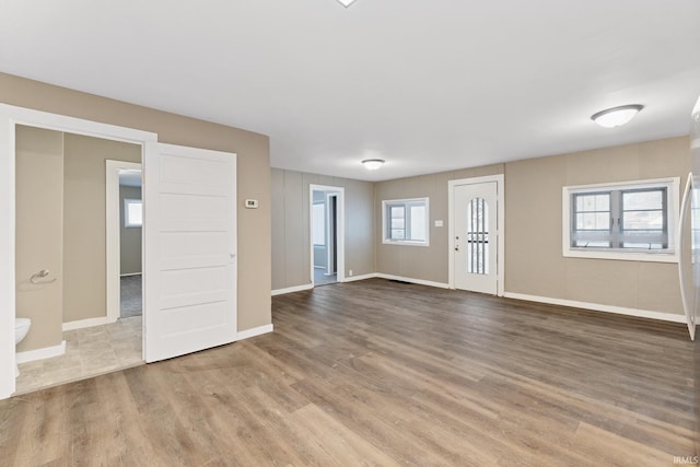 spare room featuring hardwood / wood-style floors