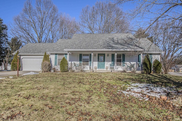 ranch-style home with a garage, a front yard, and a porch