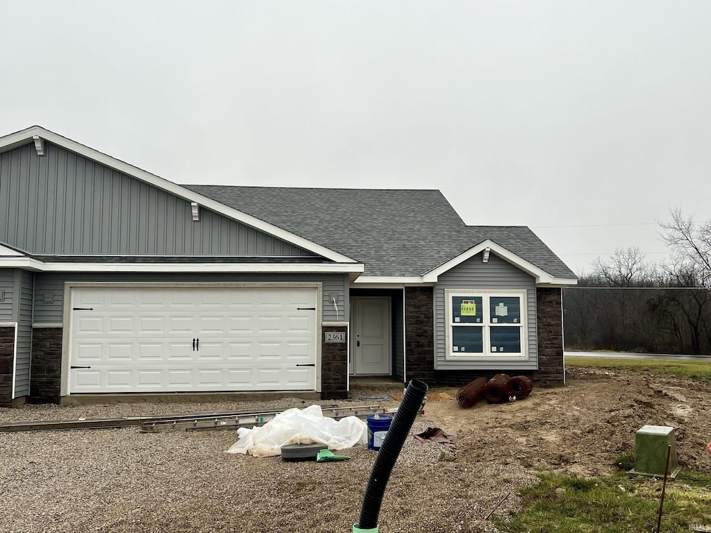 view of front of property with a garage