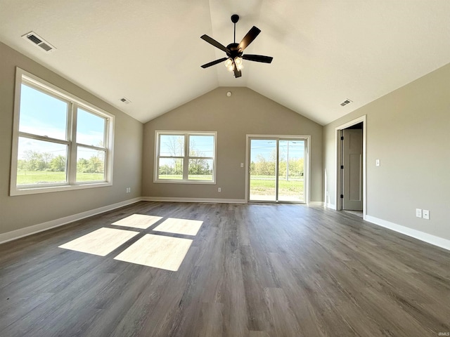 2360 Serenity Ct, Auburn, IN 46706 - unfurnished living room featuring dark wood finished floors, vaulted ceiling, a ceiling fan, and baseboards