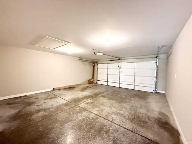 2360 Serenity Ct, Auburn, IN 46706 - garage featuring baseboards and a garage door opener