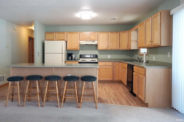 kitchen featuring range with electric stovetop, light brown cabinetry, dishwasher, sink, and white refrigerator