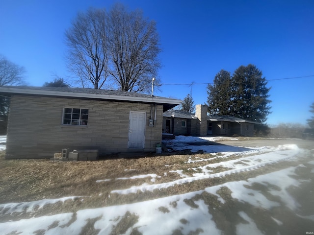 view of snow covered property