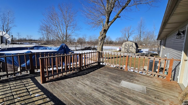 view of snow covered deck