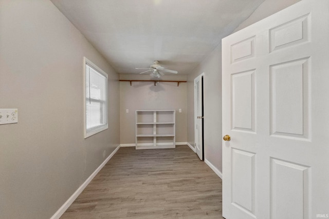 hall with light hardwood / wood-style flooring