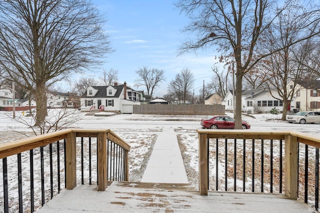 view of snow covered deck