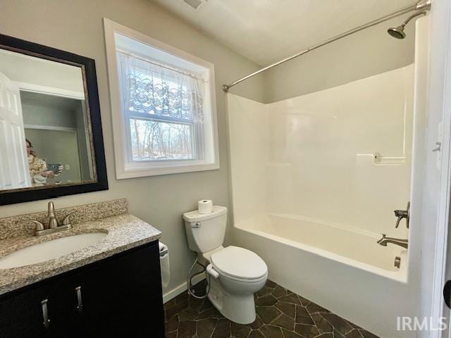 full bathroom featuring vanity, shower / bathing tub combination, and toilet