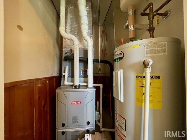 utility room with water heater