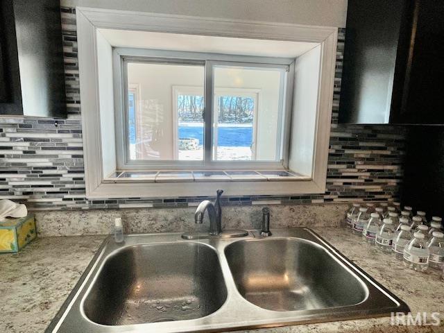 details with tasteful backsplash and sink