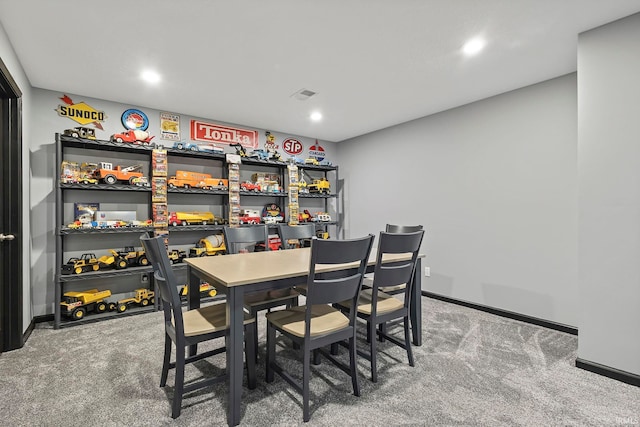 dining space with carpet flooring