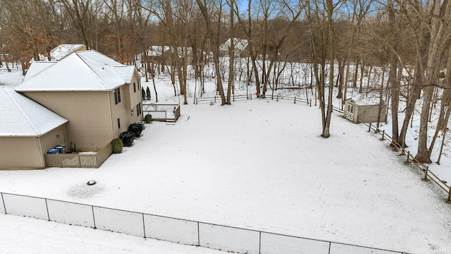 view of yard layered in snow