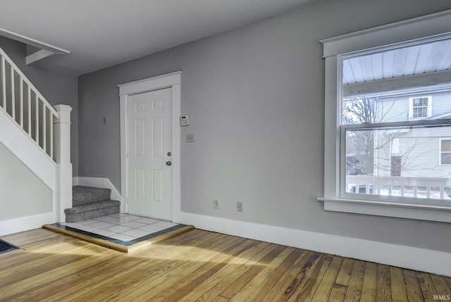 entrance foyer with hardwood / wood-style floors