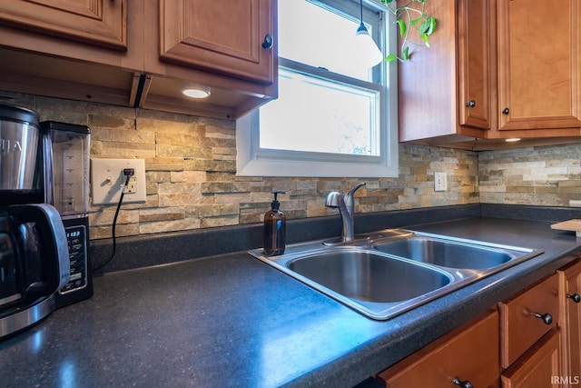 kitchen with sink and decorative backsplash