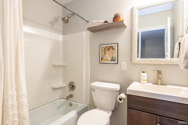 full bathroom with vanity, toilet, and shower / bath combo with shower curtain