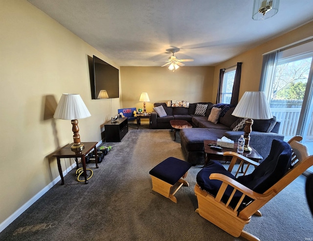 living room featuring ceiling fan and carpet flooring