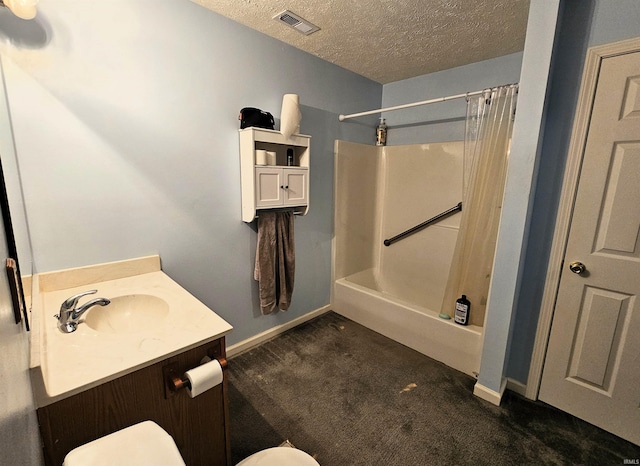 bathroom with toilet, a textured ceiling, and walk in shower