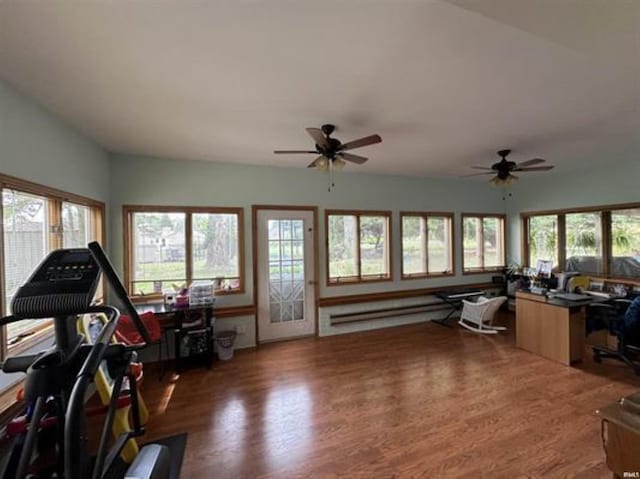 interior space featuring ceiling fan and baseboard heating