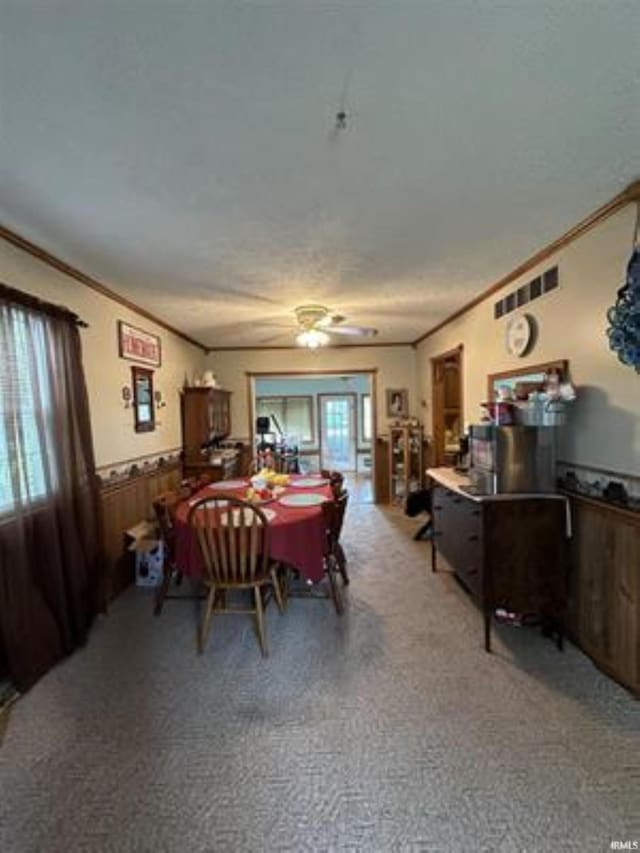 dining room with crown molding