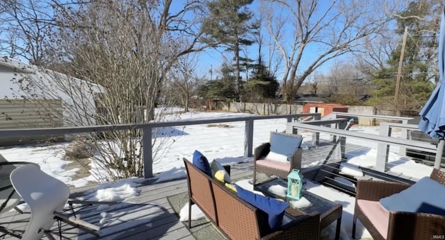 view of snow covered deck