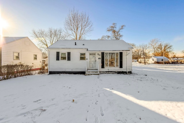 view of snow covered house