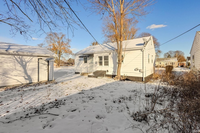 view of snow covered house