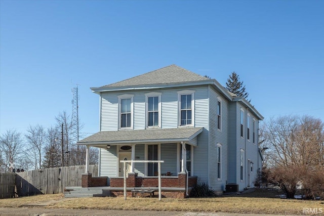 front of property with central AC and a porch