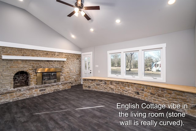 unfurnished living room with a stone fireplace, wood-type flooring, high vaulted ceiling, and ceiling fan