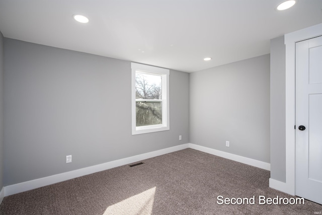 empty room featuring carpet