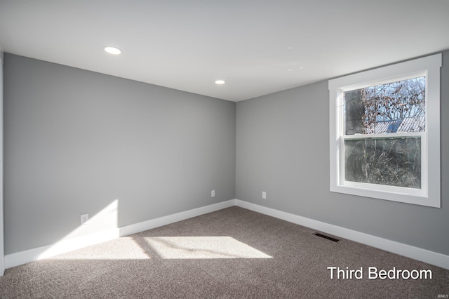 view of carpeted spare room