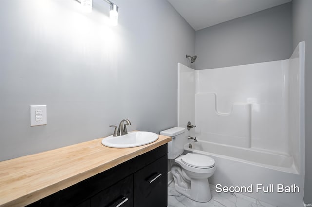 full bathroom with vanity, tub / shower combination, and toilet