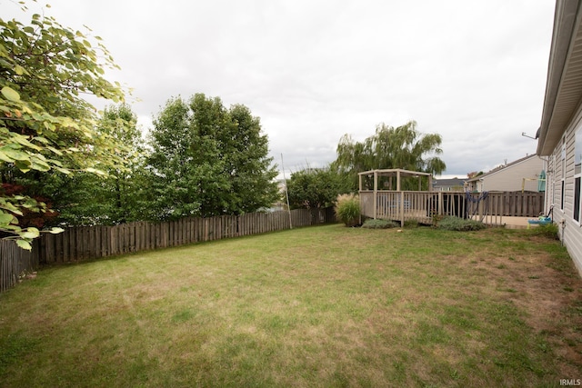 view of yard featuring a deck