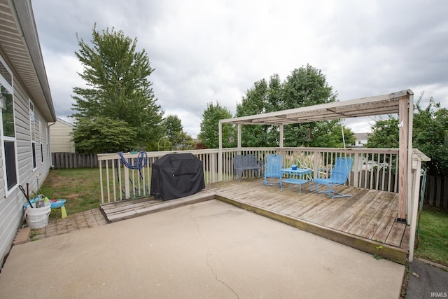 view of patio / terrace with a grill, a pergola, and a deck