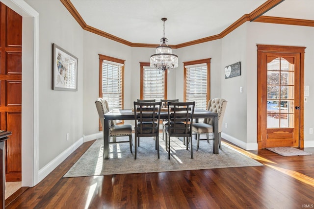 dining room featuring dark hardwood / wood-style floors and a healthy amount of sunlight