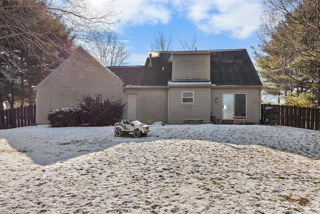 view of snow covered property