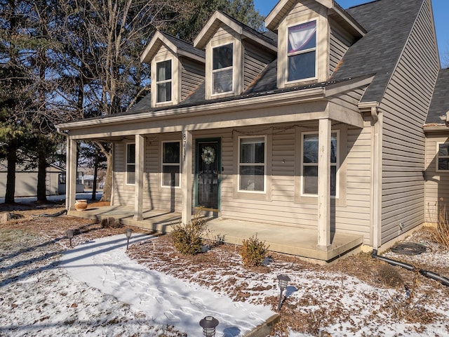 cape cod home with covered porch