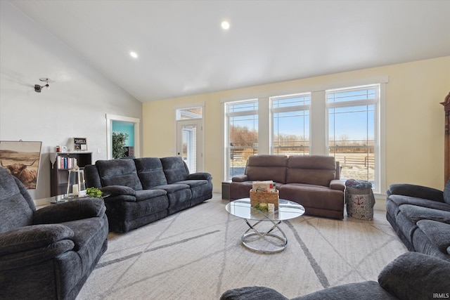 living room with vaulted ceiling