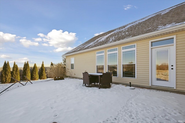 view of snow covered property