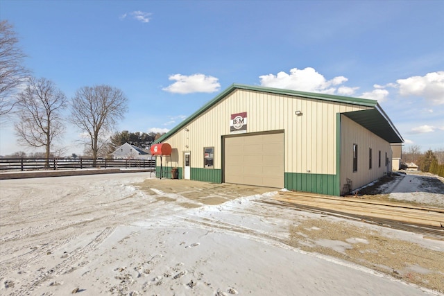 view of outbuilding with a garage