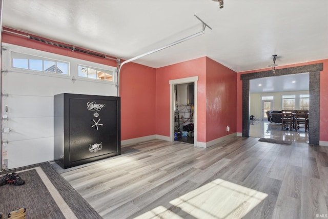 entryway with a wealth of natural light and light wood-type flooring