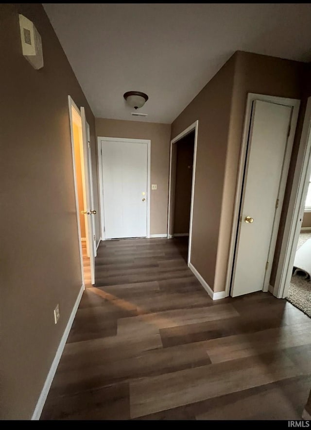 hall featuring dark hardwood / wood-style flooring