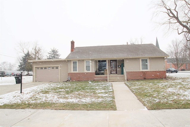 ranch-style home featuring a garage