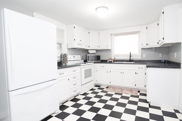 kitchen with white cabinetry, white appliances, and sink