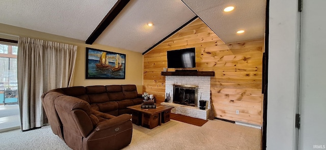 living room with vaulted ceiling with beams, a textured ceiling, light carpet, a brick fireplace, and wood walls