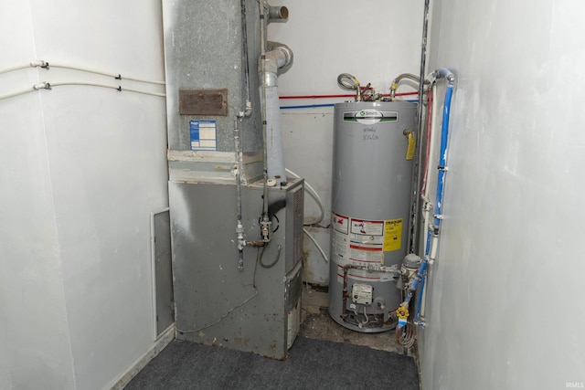 utility room featuring heating unit and gas water heater