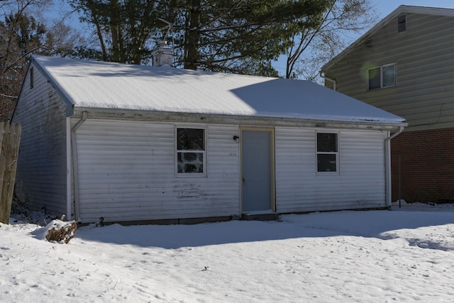 view of snow covered property