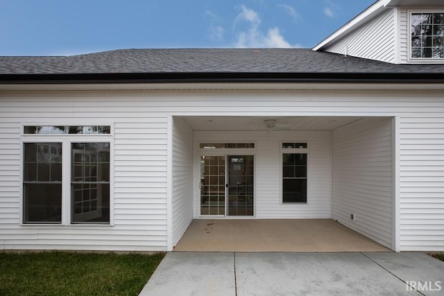 doorway to property featuring a patio